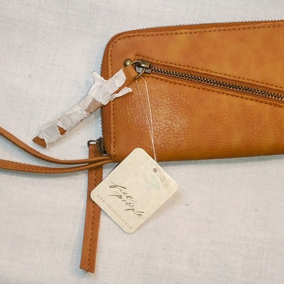 Free People Handbags - Free People Brown Wallet New With Tags.